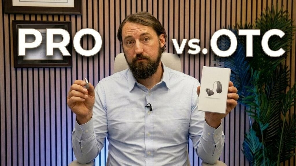 'Pro vs. OTC' Jordan Coates holding two hearing aid boxes.